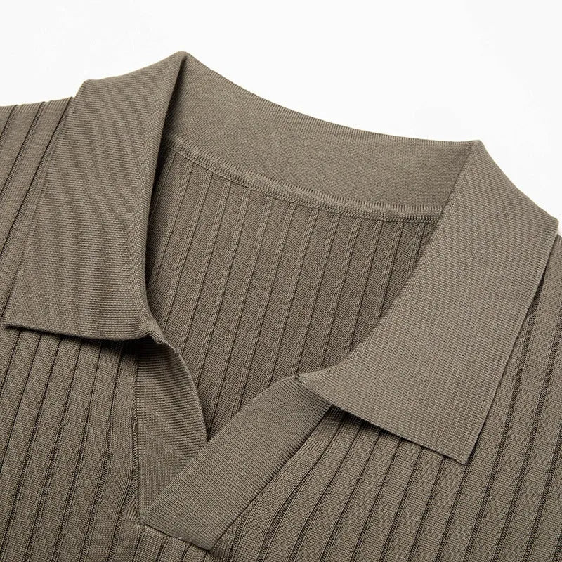 Man wearing a striped mulberry silk T-shirt with a short sleeve and lapel collar.