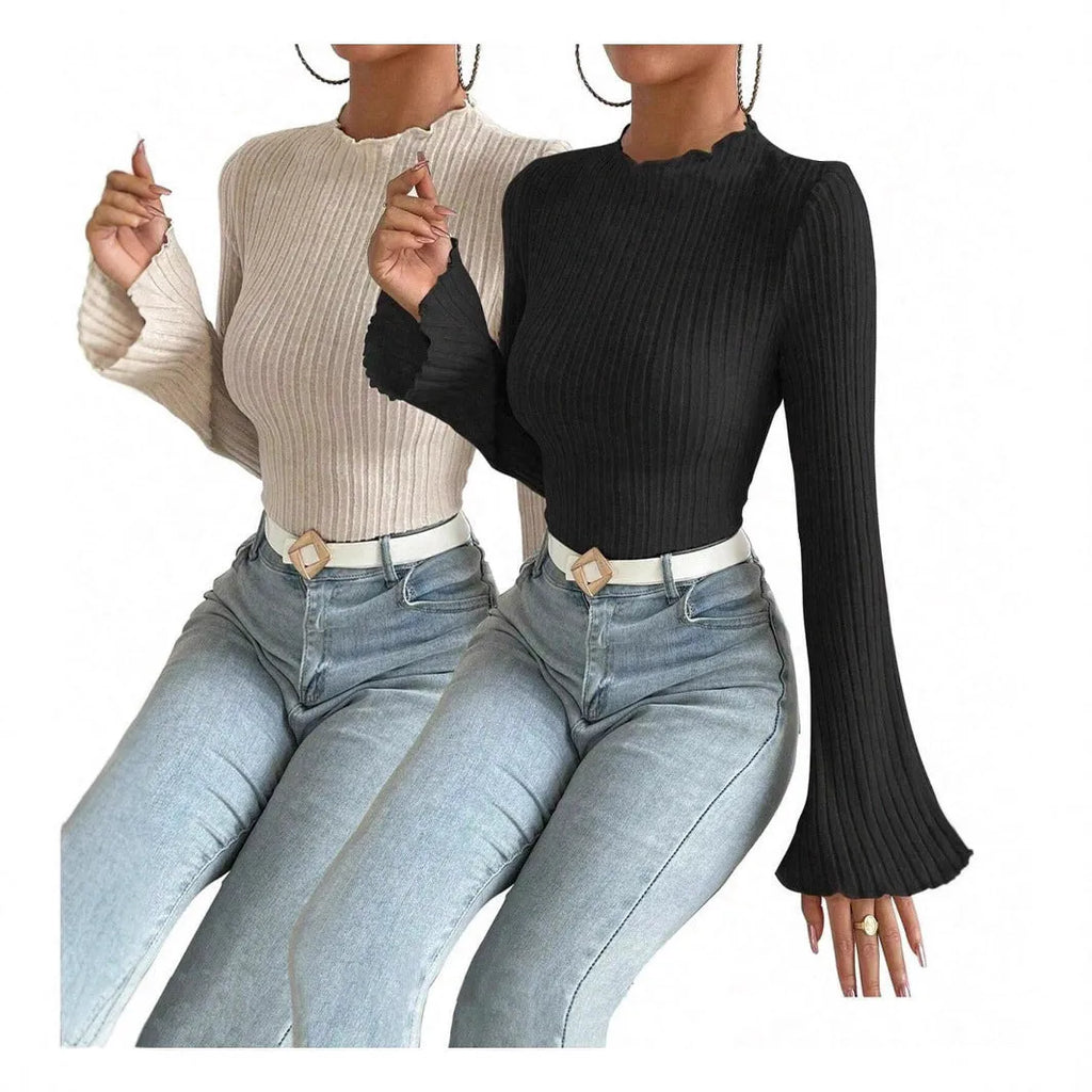 Slim fit long sleeve top with lantern sleeves in black brushed polyester fabric, showing sunken stripe detail and round neck.