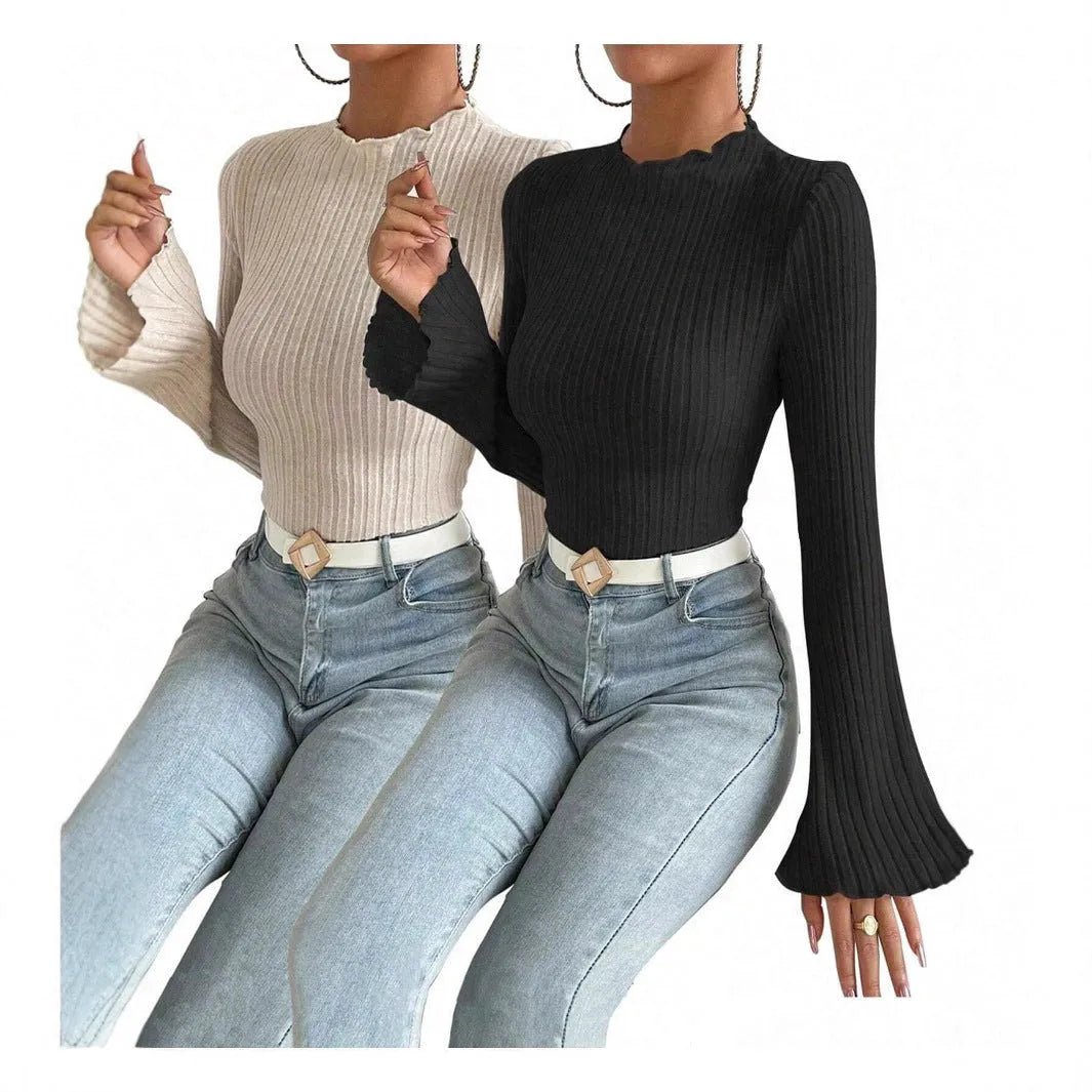 Slim fit long sleeve top with lantern sleeves in black brushed polyester fabric, showing sunken stripe detail and round neck.