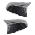 Pair of paint bright black BMW F-Series rear-view mirror replacement shells.