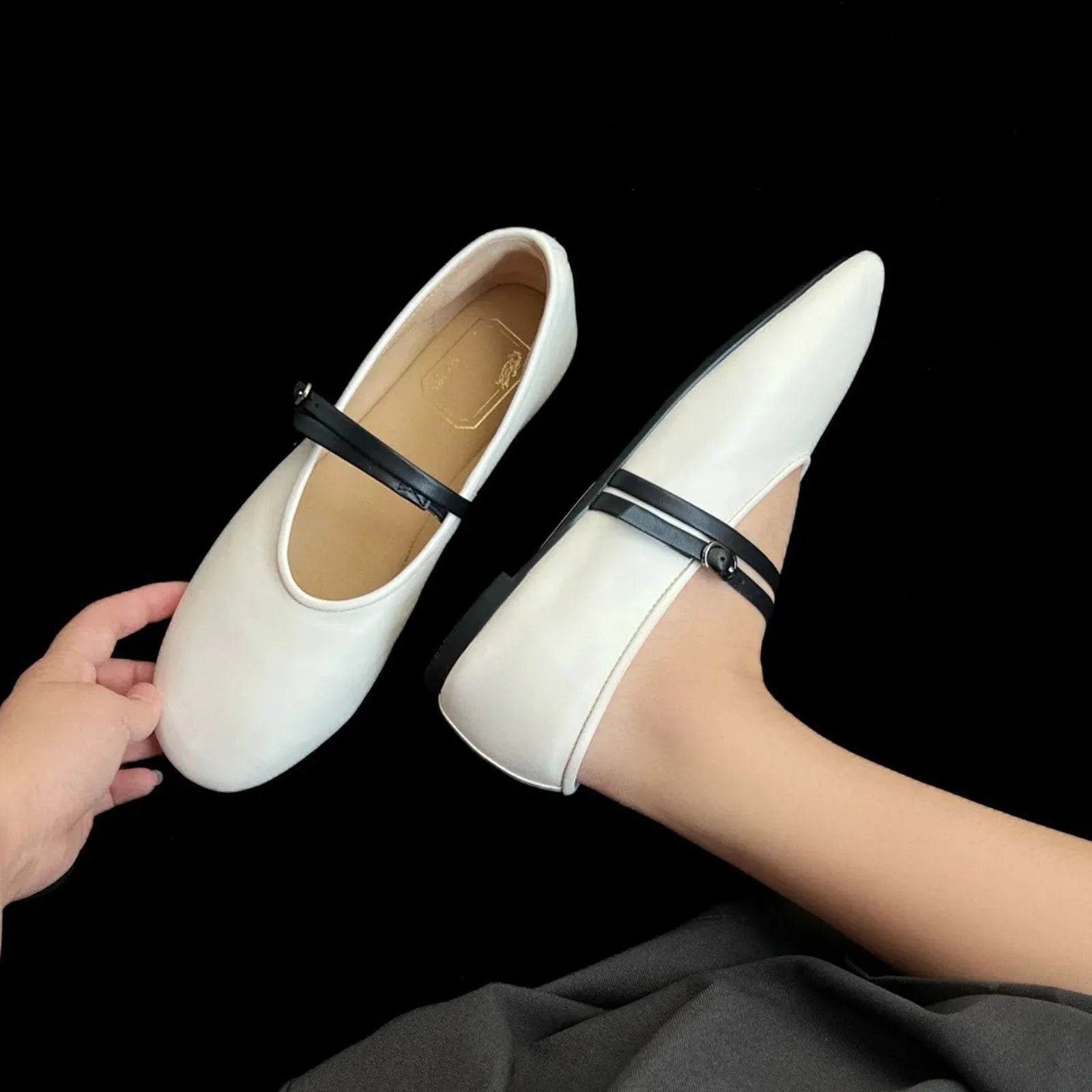 Soft retro round toe Mary Jane flat shoes in black sheepskin leather with buckle closure and low heel