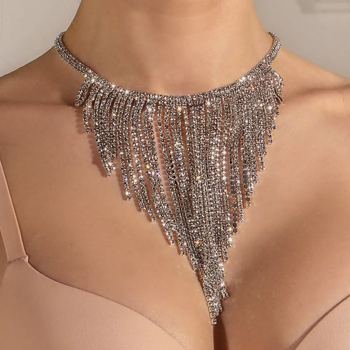 Double row alloy necklace with rhinestones in gold colour, symmetrical design