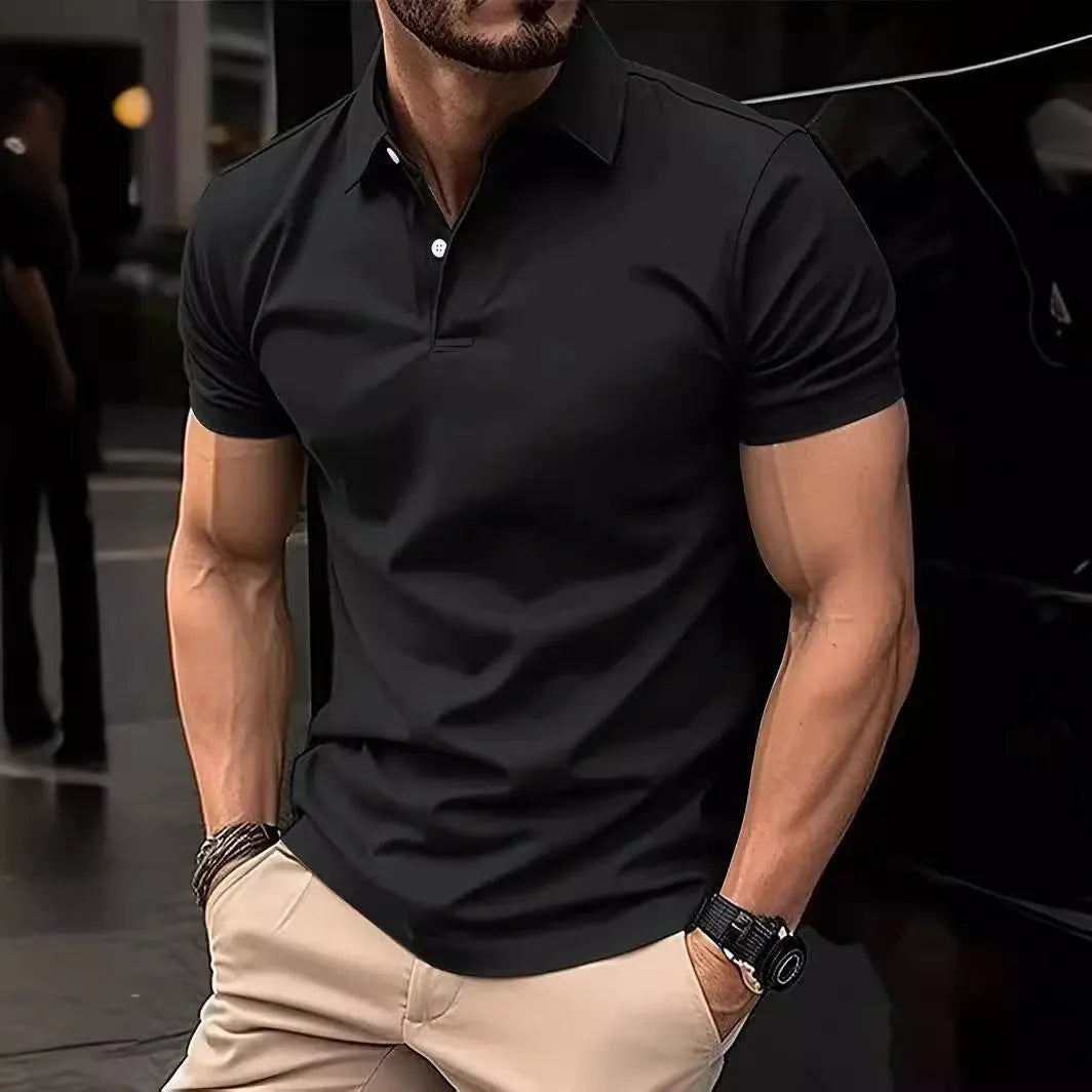 Man wearing a slim-fit solid colour short sleeve button-up casual shirt in a cotton blend fabric.