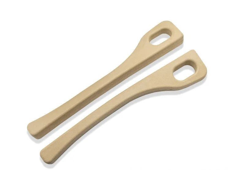 Two polyresin car seat gap sealing strips in chosen colour, showing integrated handle.