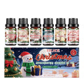 Christmas aromatherapy oil set showing six bottles with holiday scents for home fragrance