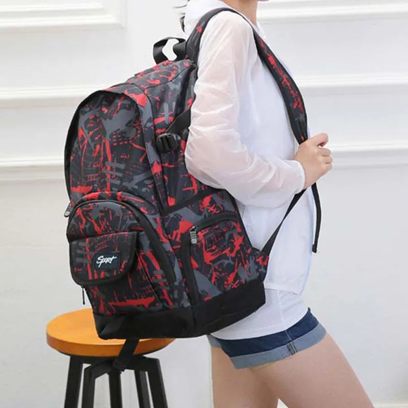 Blue and red classic nylon backpack showing front view and multiple compartments