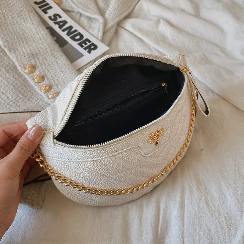 Women's one-shoulder chain crossbody bag in white PU with sandwich pocket and zipper change bag on a model