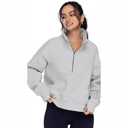 Loose lapel fleece-lined women's sweater in a solid colour, shown with raglan sleeves.