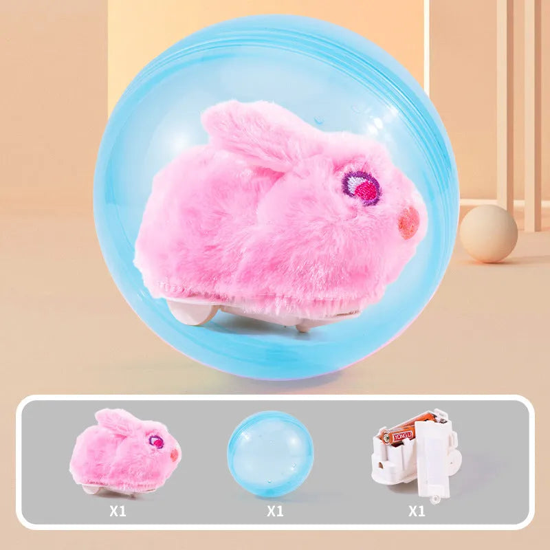 Transparent plastic hamster rolling ball with plush shell in beige hamster design and battery base