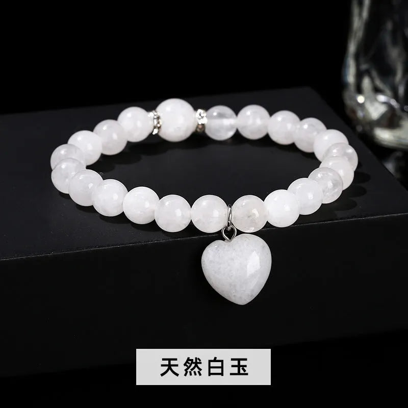 Handmade natural crystal bracelet with six stone types in geometric round beads, showing 8mm and 10mm purity size options