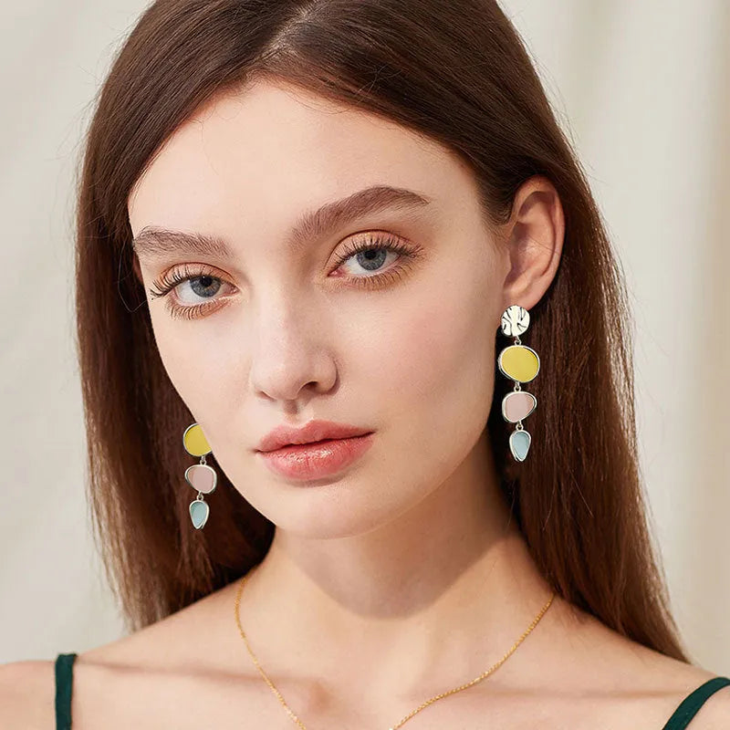 Morandi three-colour wafer disc earrings with needle post fitting on alloy base