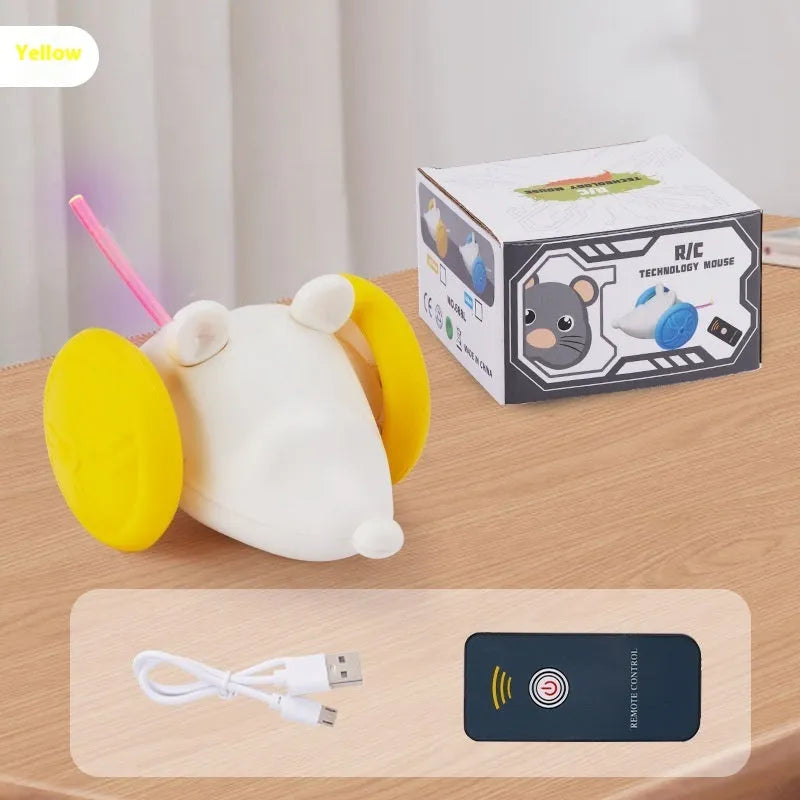 Electric moving mouse cat toy with remote control and charging cable on blue background
