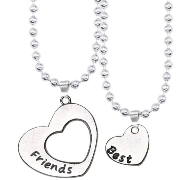Two silver alloy heart-shaped puzzle necklaces on cross chains, matching set