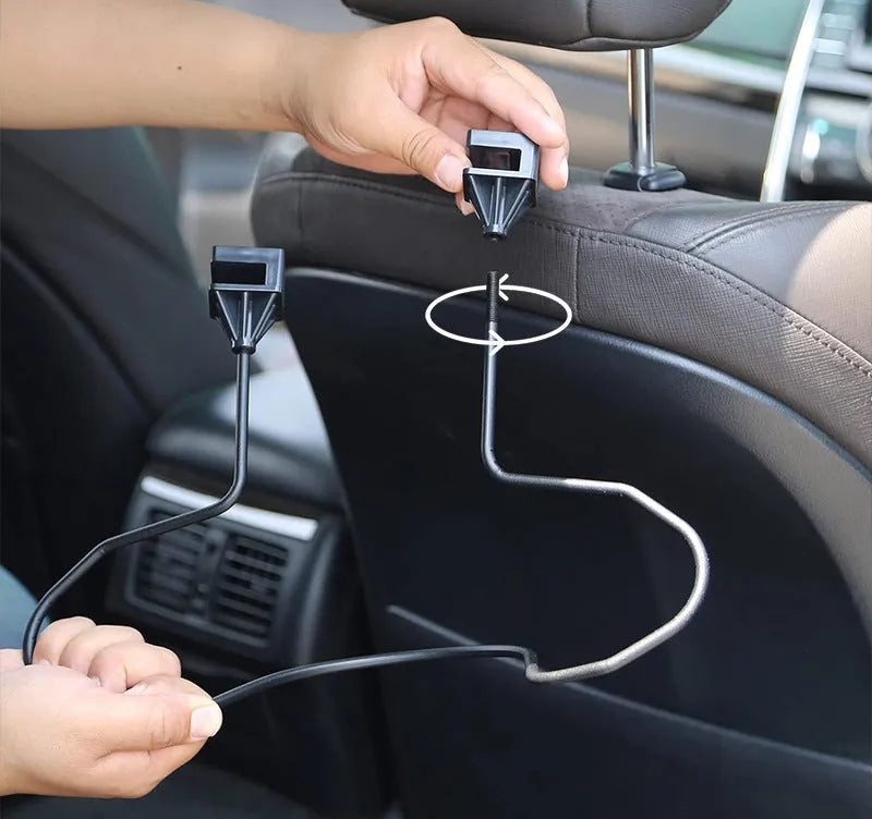 Black metal snap-on hat bracket for car interior display stand holding a hat