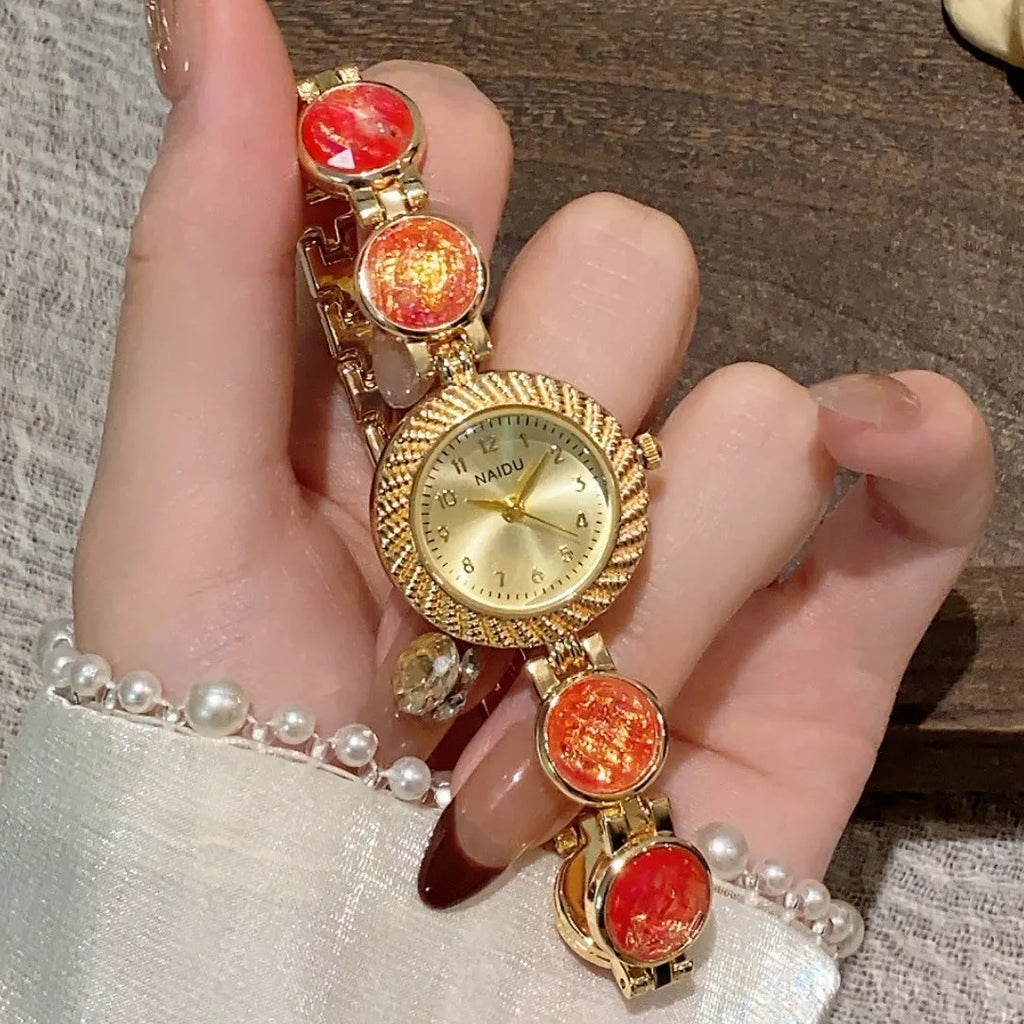Women's quartz watch with round 25mm dial in milky white colour, zinc alloy case, and spiral crown.