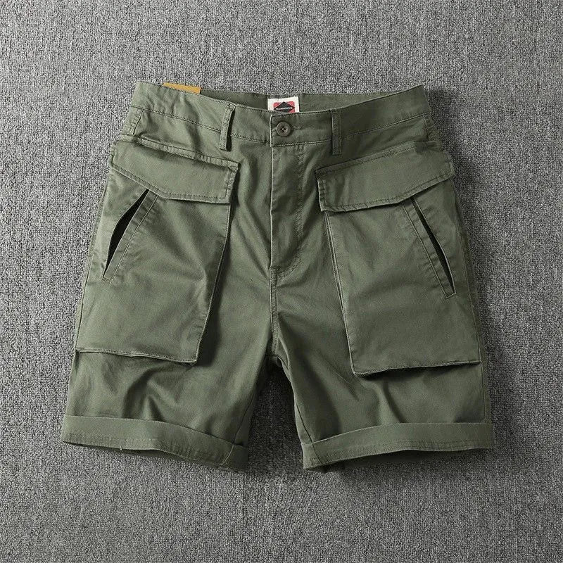 Men's straight-leg cotton cargo shorts in khaki with multiple pockets and stretch fabric.