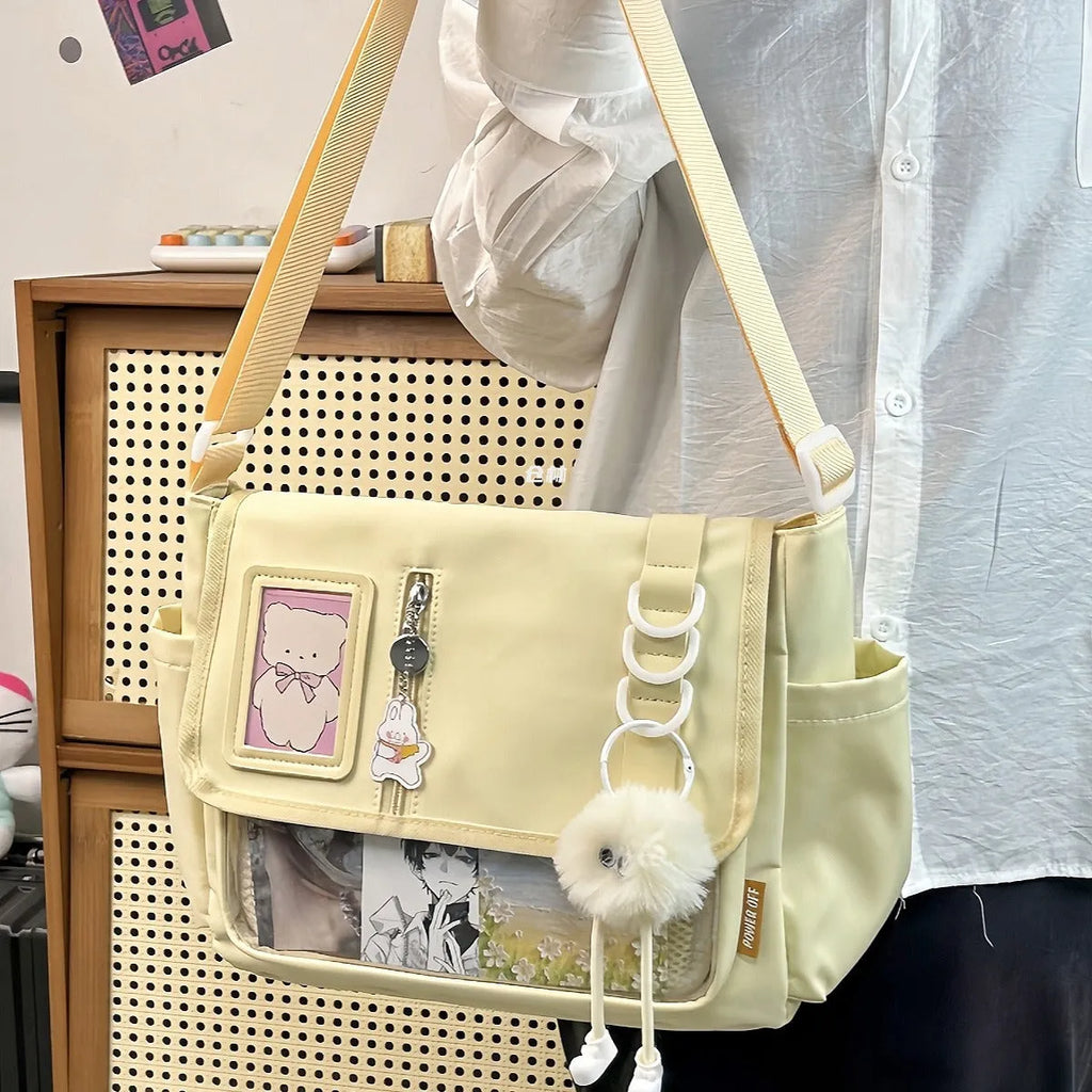 Canvas crossbody bag, waterproof, lightweight, 33x27x15cm, with fur ball pendant, black option