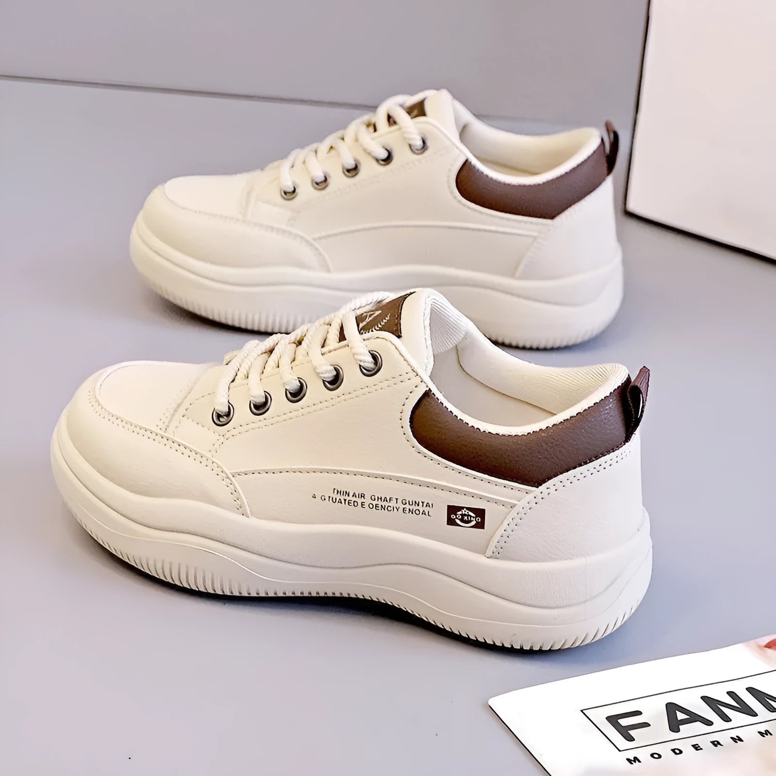 Women's Korean-style white synthetic leather shoes with cross straps and lace-up design