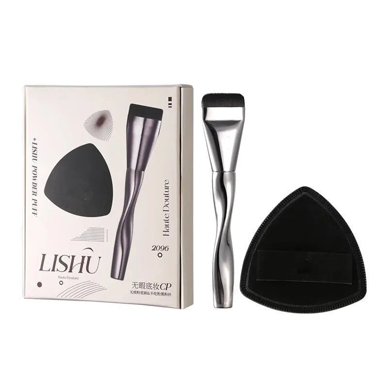 Spiral one-shaped black powder foundation brush with long handle and puff on pineapple box.