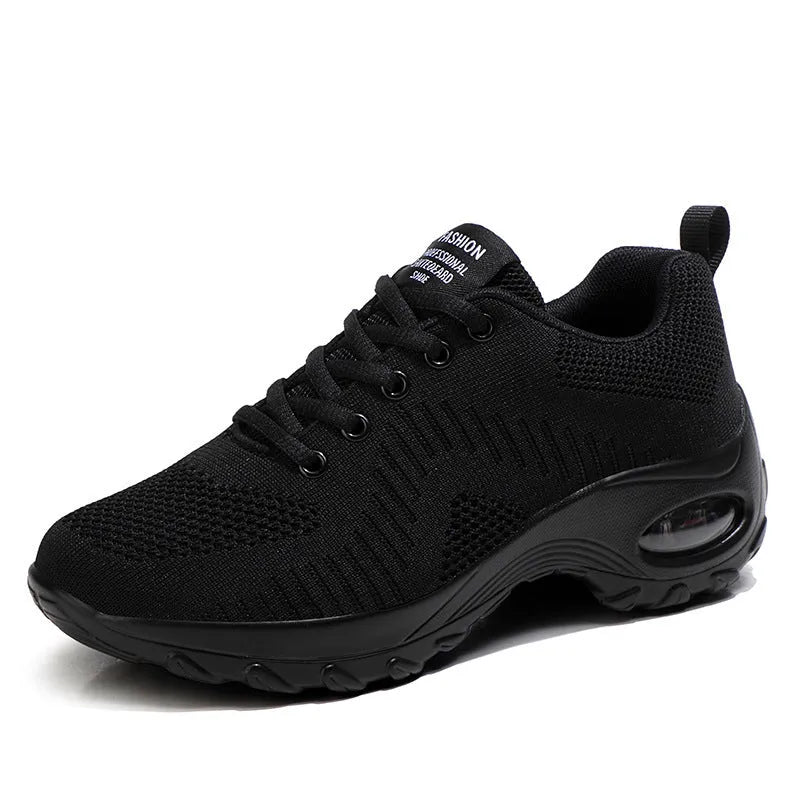 Women's round toe front lace-up low top mesh sneakers in black with flat heel for casual sports