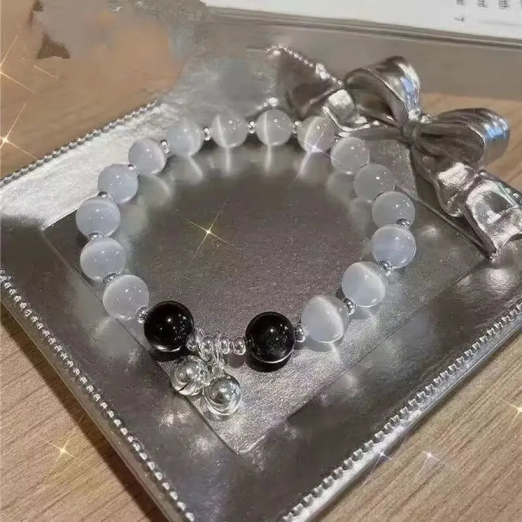 Glass butterfly bracelet for women with drop-shaped coloured glaze beads in grey moonlight colour option