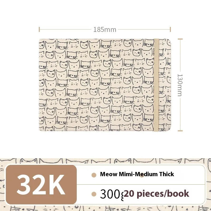 Feiluniao handmade fabric watercolour notebook with illustrated cover, open to show blank paper pages.