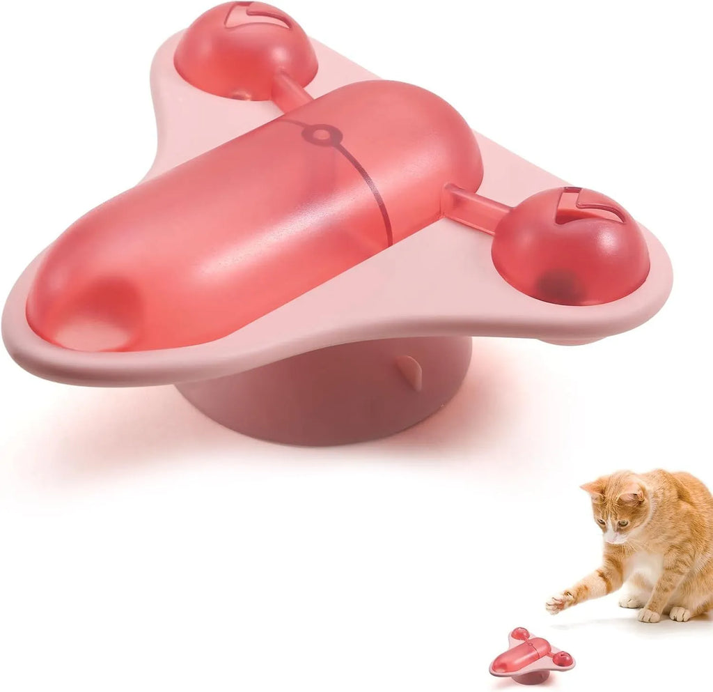 Blue interactive pet puzzle toy with aeroplane snack compartment, bell, and catnip on suction cup base