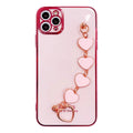 Silicone phone case with wrist bracelet for Samsung smartphones in solid green, pink, purple, or light green.