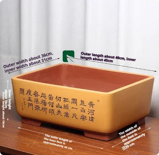 Purple clay Chinese style flower pot with plant on desktop, available in multiple colours and sizes