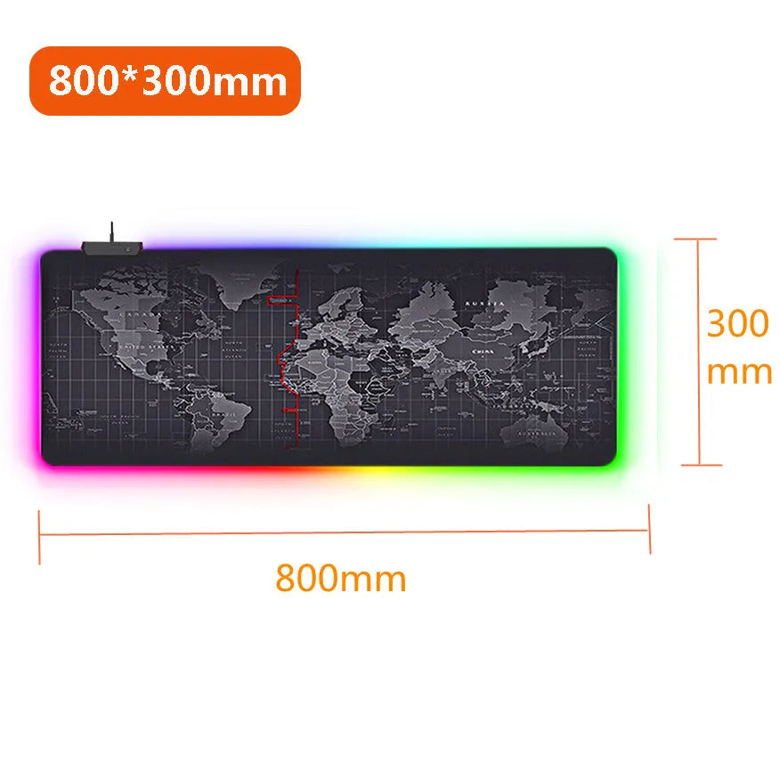 Large RGB luminous gaming mouse pad with colourful waterproof cloth surface on desk with keyboard and mouse