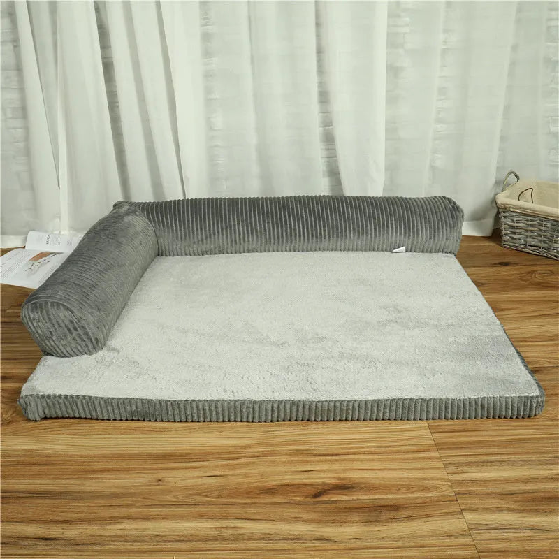 Corduroy dog bed with bolster sides in coffee colour on hardwood floor