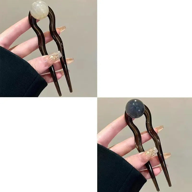 Simple U-shaped acrylic barrettes with ball retro design in beige, caramel, dark gray and green colours
