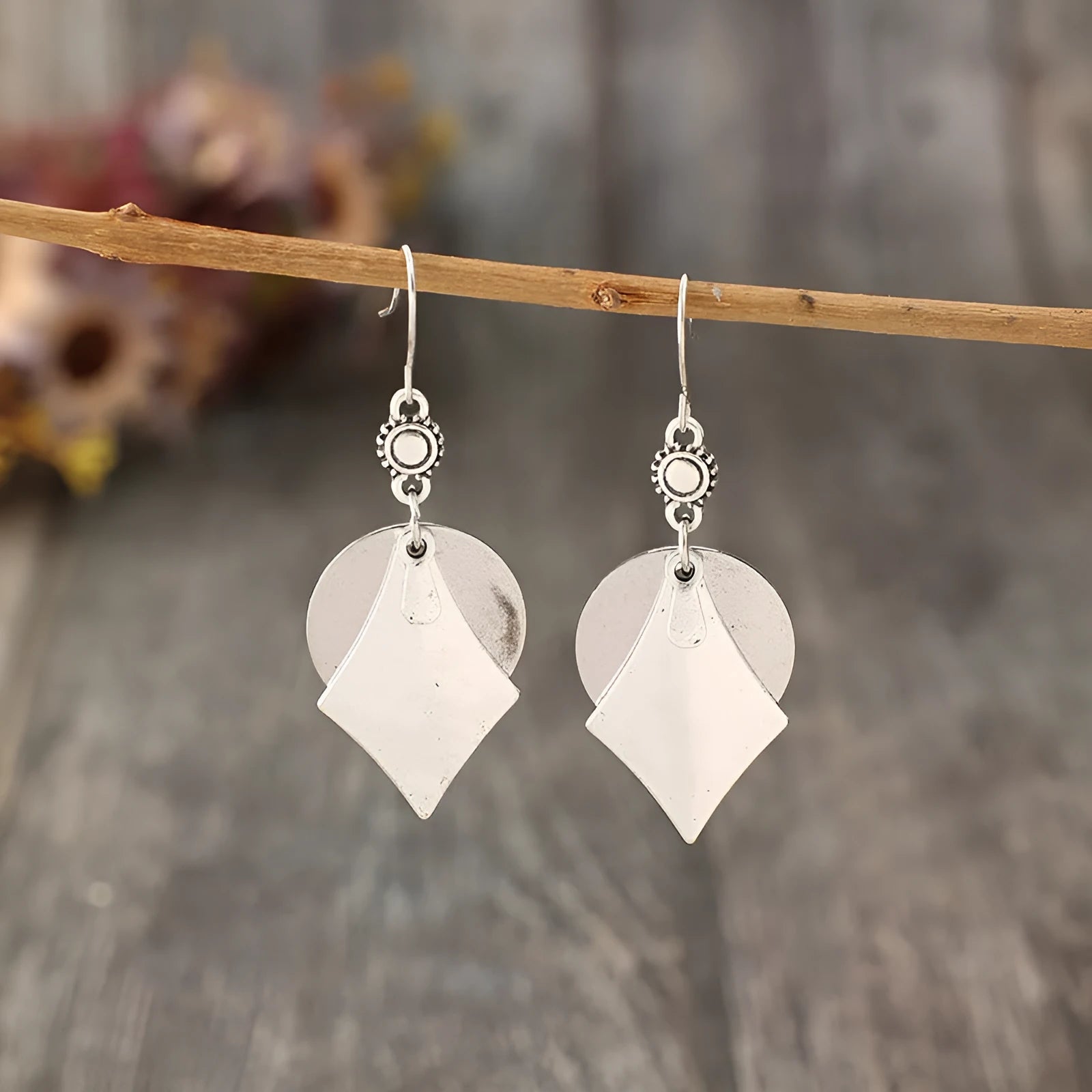 Silver geometric alloy earrings with layered retro design and round shape