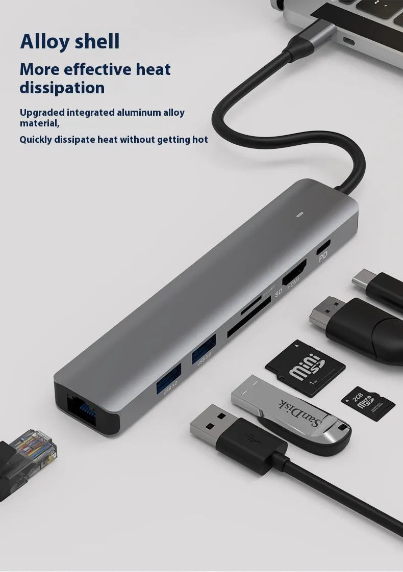 7-in-1 USB C computer hub with SD card slots and charging port for laptop connectivity expansion