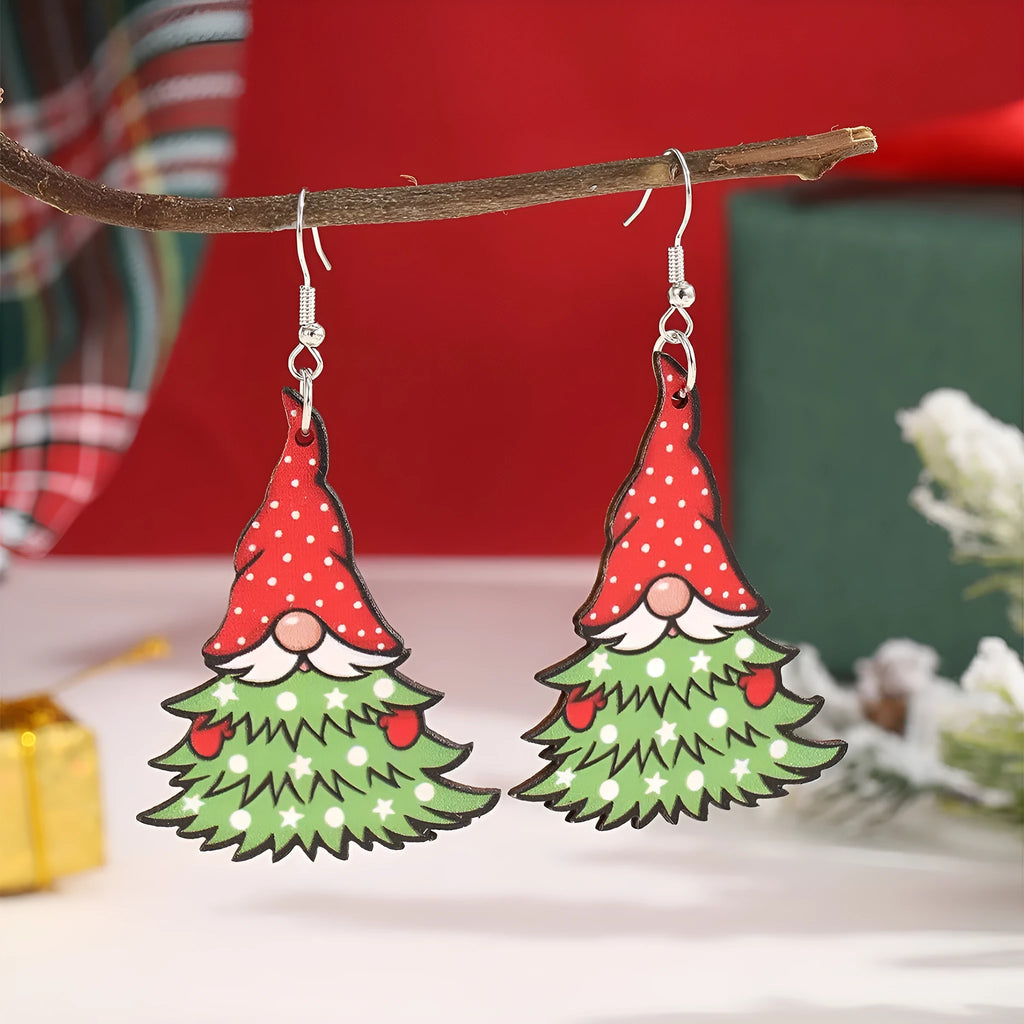 Wooden Christmas earrings with printed tree and snowman designs on geometric shapes