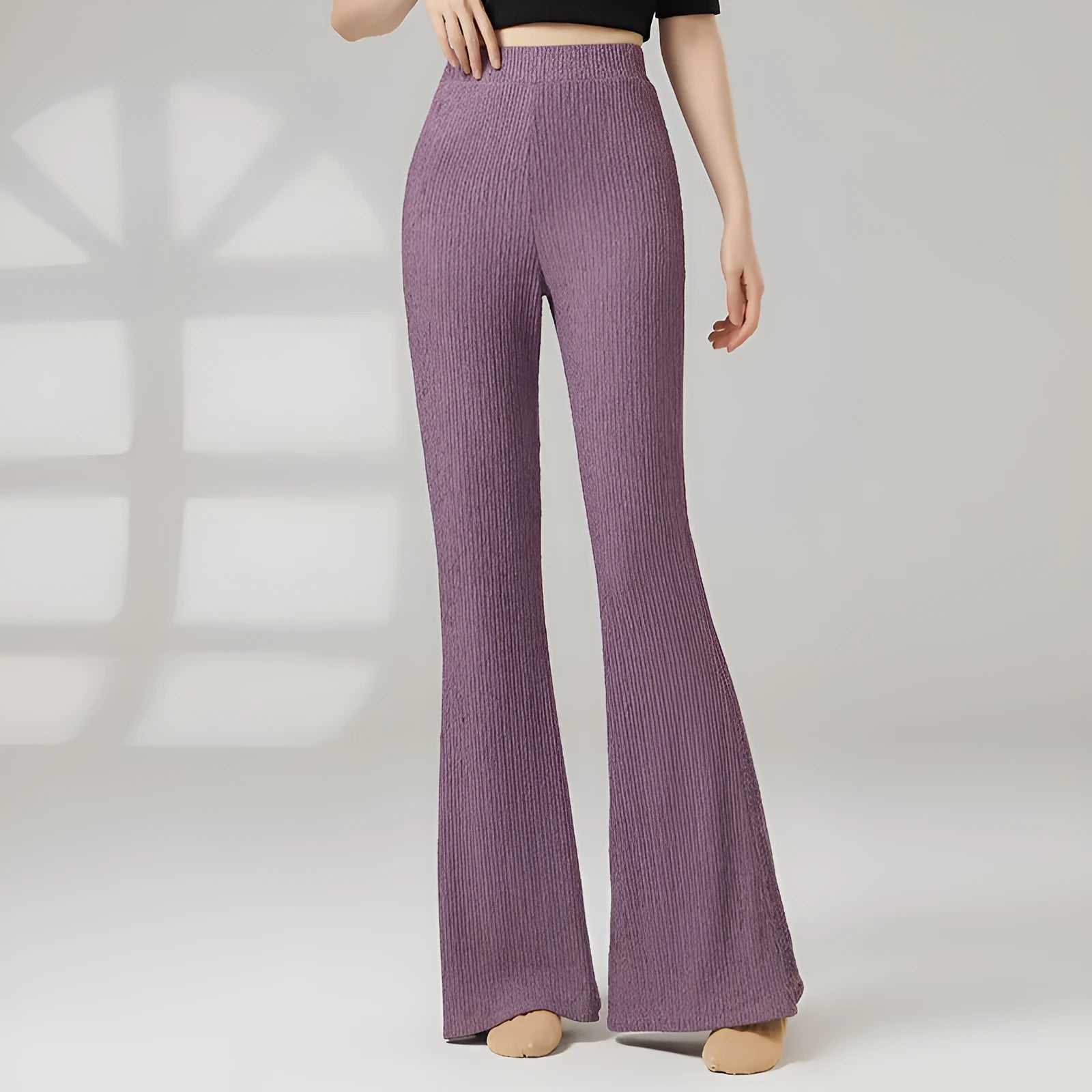 Women's solid colour polyester dance practice pants for classical ballet and body training.