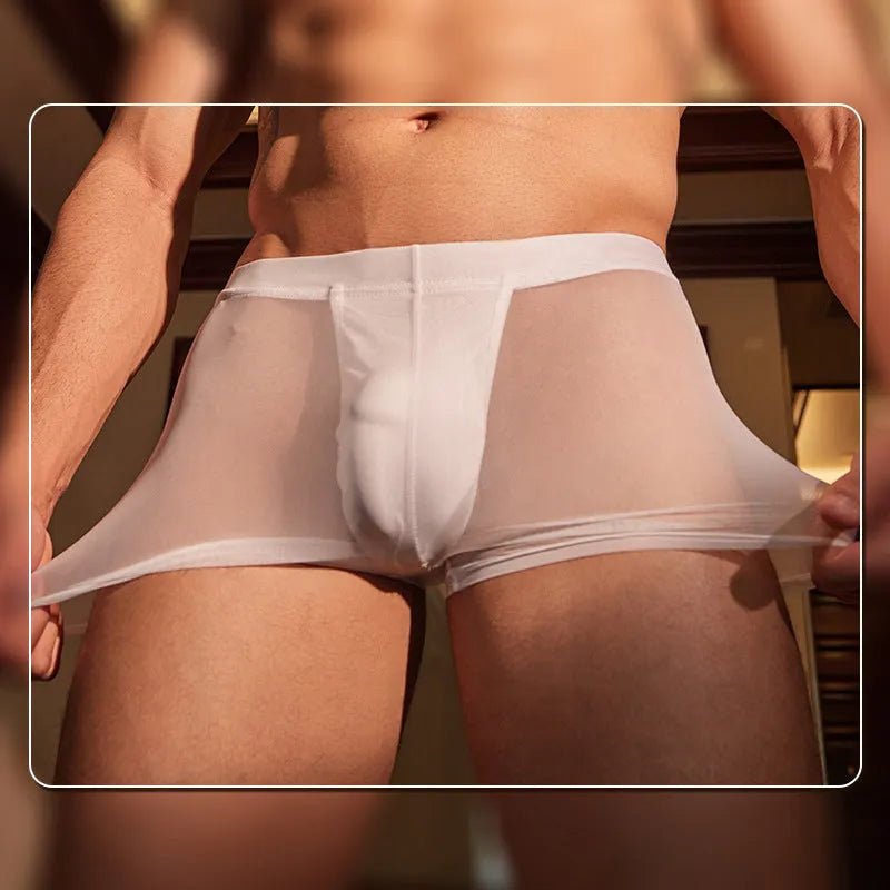 Men's black and white breathable nylon boxer briefs on a plain background.