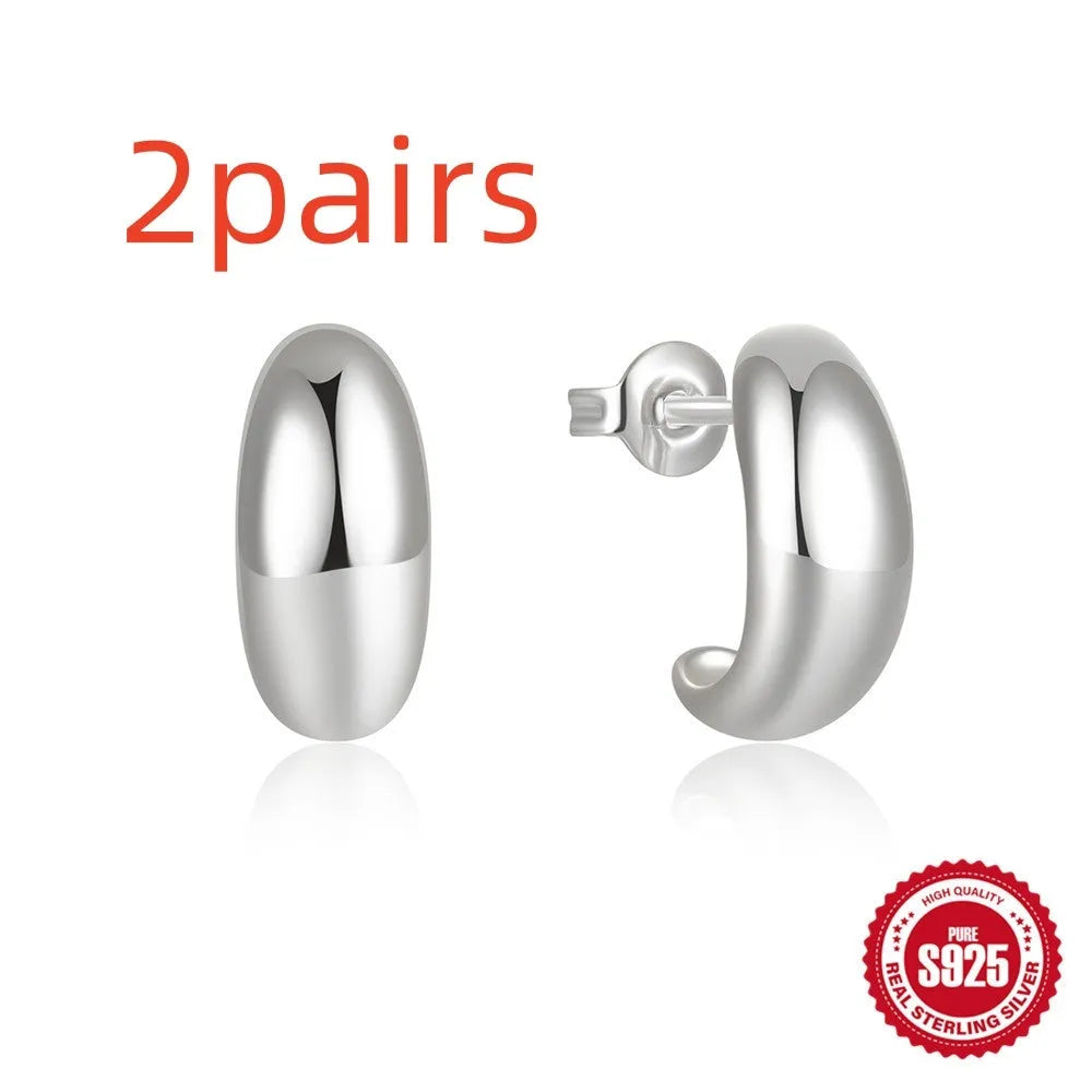 925 sterling silver C-shaped geometric stud earrings with glossy gold electroplated finish