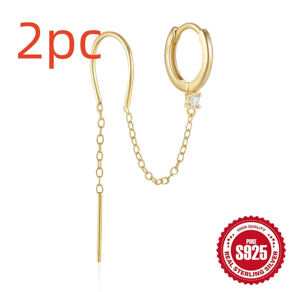 Golden S925 sterling silver stud earrings with a geometric diamond flower and delicate tassel chain design.