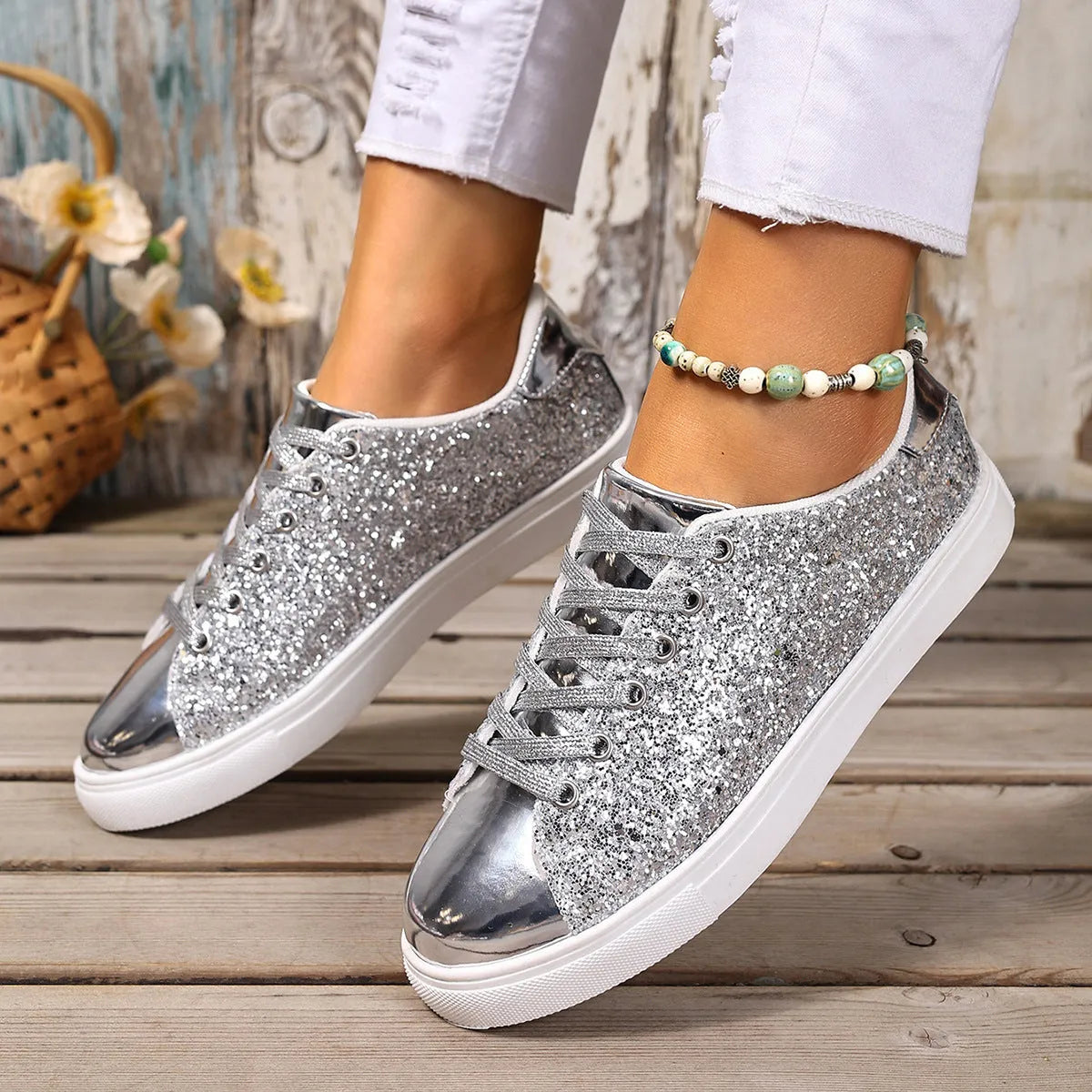 Women's black plus size board shoes with sequin detailing and white front lace-up fastening on a rubber sole.