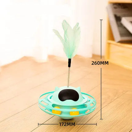 Pink cat tumbler turntable toy with rotating platform and dangling cat stick for interactive feline play