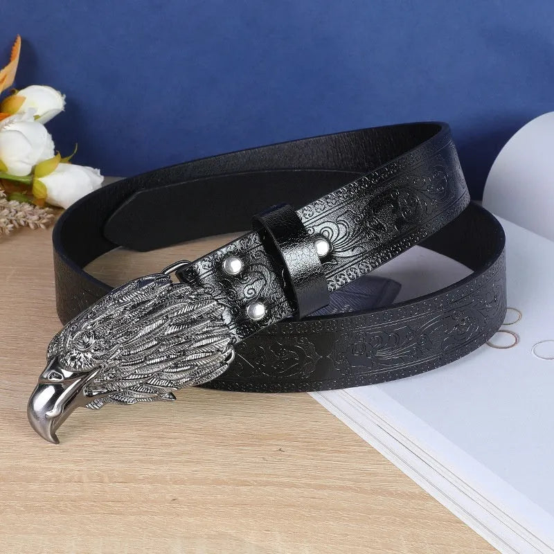 Men's belt with detailed cow head alloy buckle on imitation leather strap with pin buckle fastening