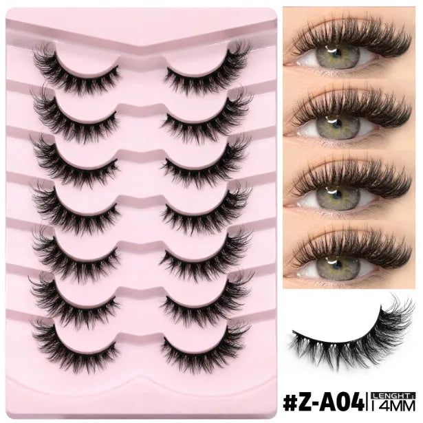 Box of natural style false eyelashes made from artificial fibre, showing thick dense lashes.