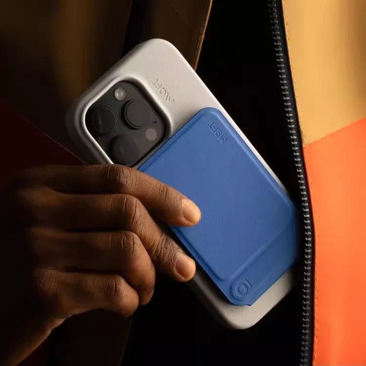 Slim magnetic mobile phone holder case in four colour options showing leather and fibre glass construction