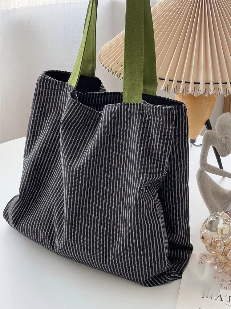 Canvas tote shoulder bag in plaid or striped design with multi-layer compartments