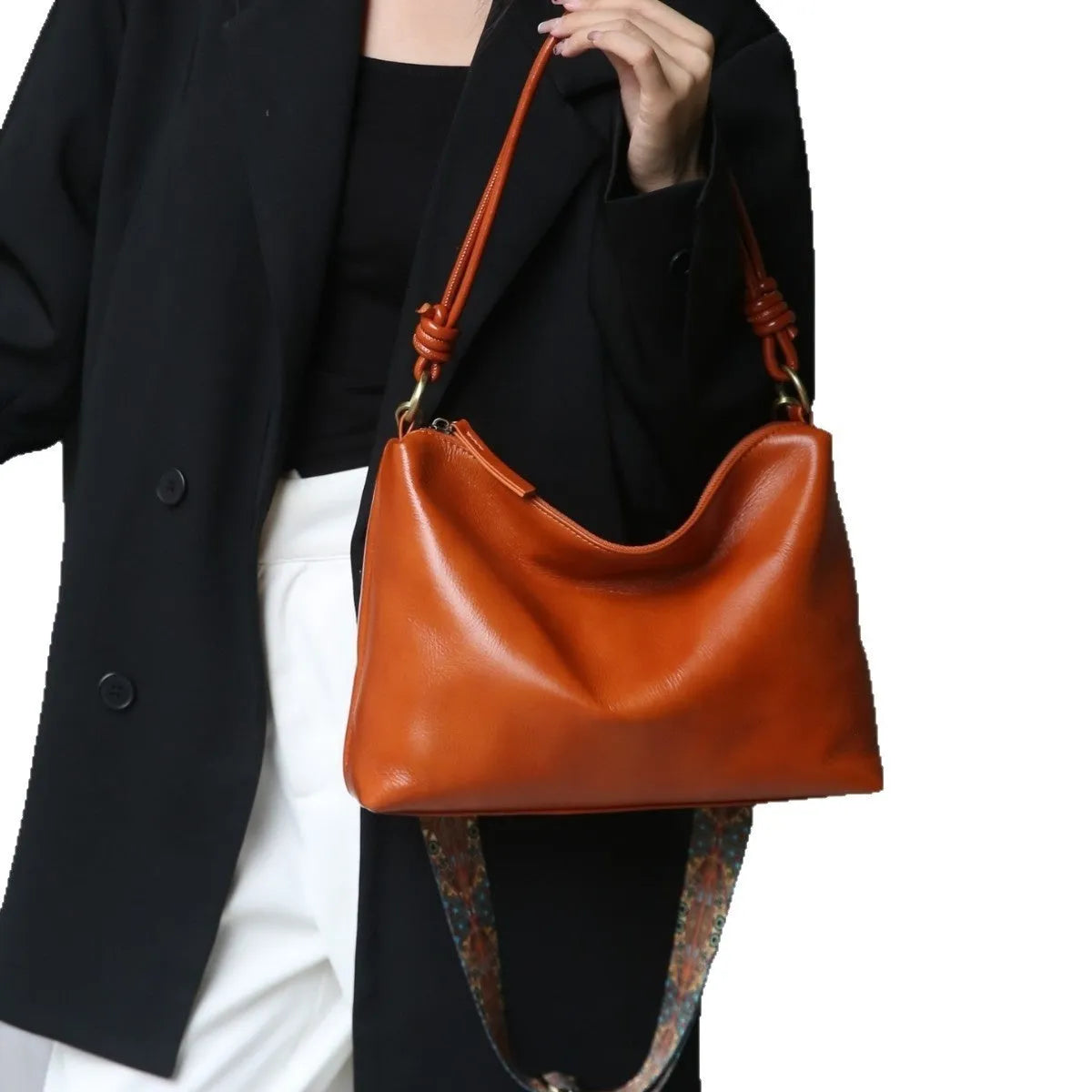Genuine leather hand shoulder bag in caramel colour, pillow shape, top grain leather, 31x11x24cm