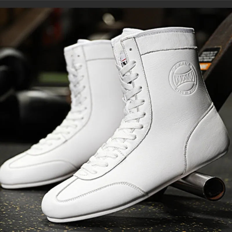Black gold mesh professional boxing shoes with white leather accents and rubber sole