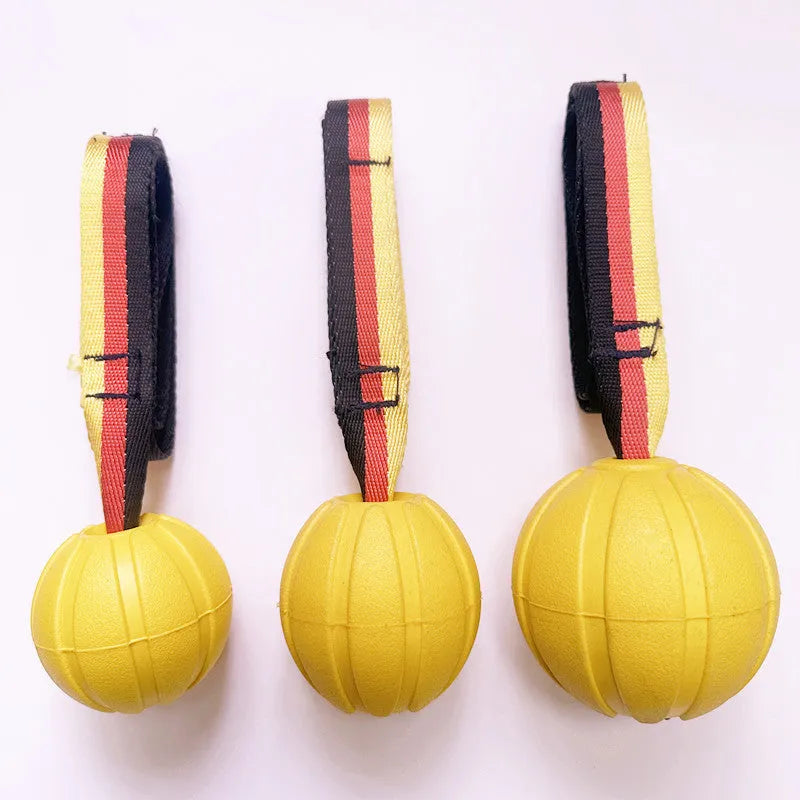 Floating EVA pet training ball in yellow and camouflage colours showing three diameter sizes for water fetch