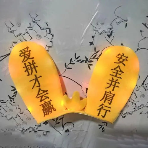 Rabbit Glow helmet decoration with Velcro bottom on a ski helmet, shown in blue LED style.
