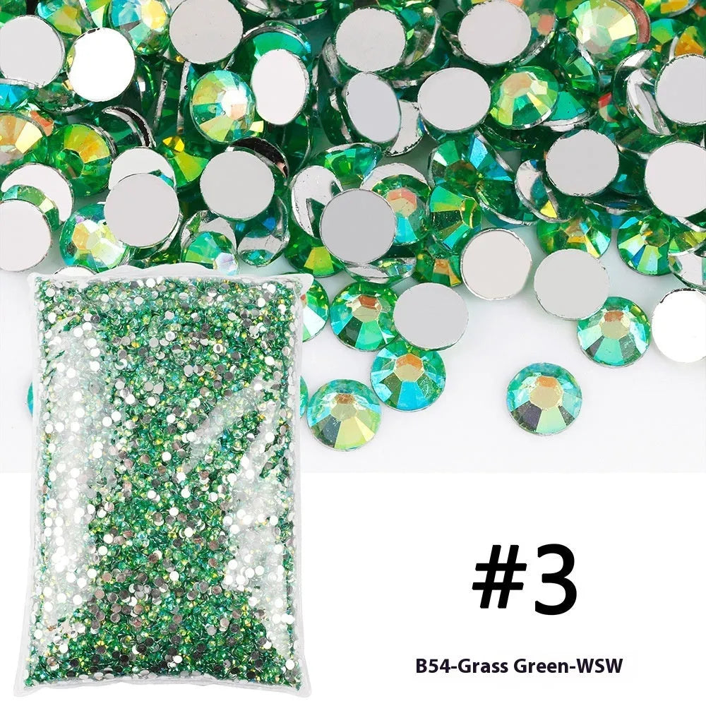 Plastic resin nail art rhinestones in multiple colours with electroplated surfaces arranged in mesh packaging